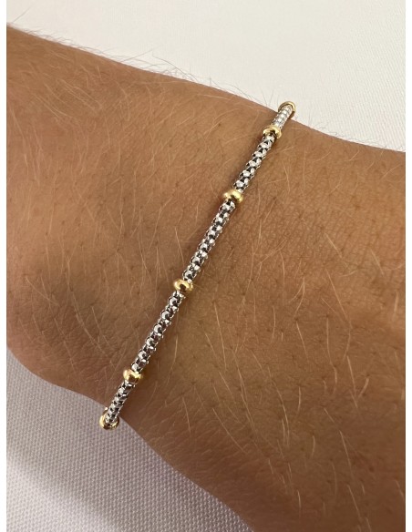 Pulsera en Oro 18k Bicolor con Bolas